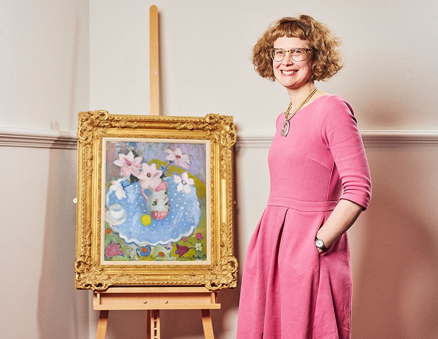 Alice Strang with Anne Redpath’s Still Life on a Patterned Tablecloth. Photo by Alex Robson.